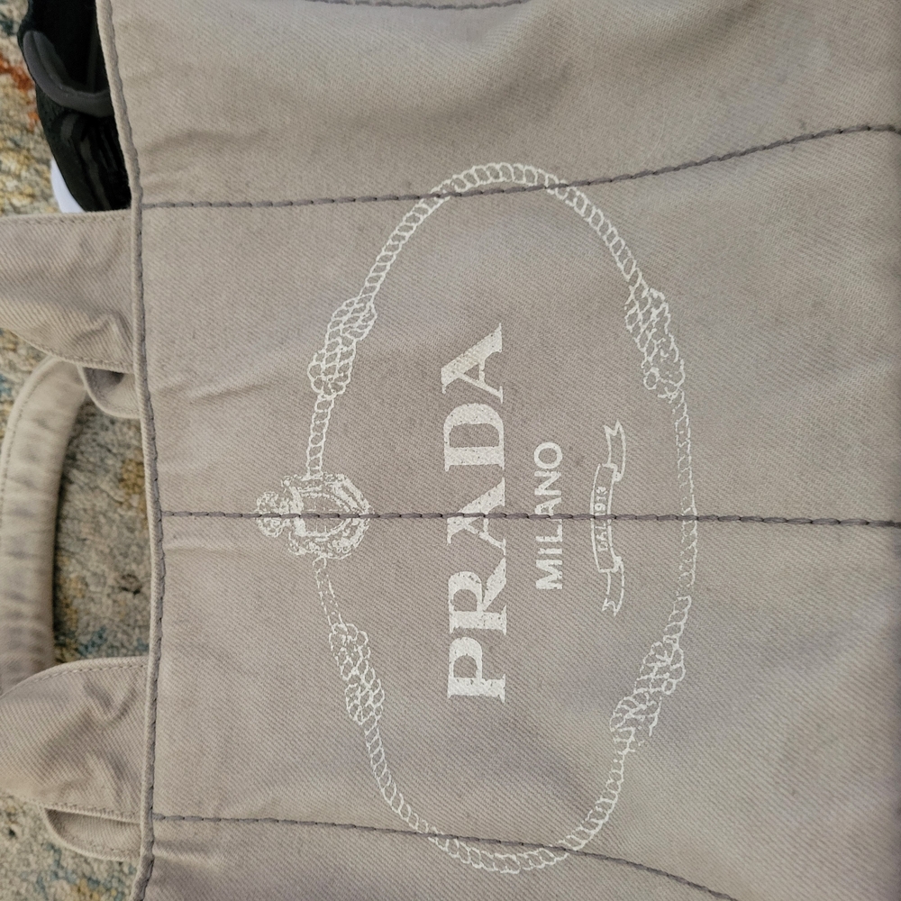 Prada Gray Oval Logo Tag